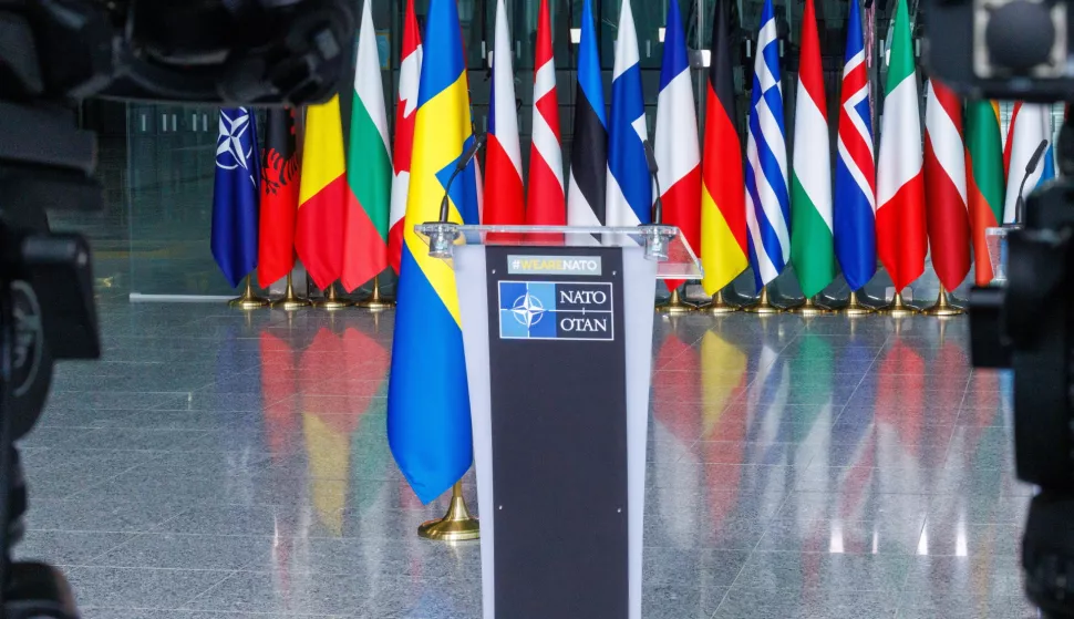 epa11213772 The Swedish flag stands waiting in the VIP entry hall for NATO Secretary General Jens Stoltenberg and Swedish Prime Minister Ulf Kristersson to officially start the flag-raising ceremony to mark the accession of the Kingdom of Sweden to NATO at the Alliance headquarters in Brussels, Belgium, 11 March 2024. EPA/OLIVIER MATTHYS