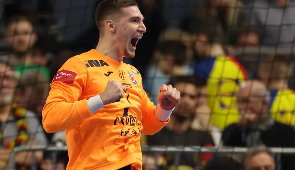 epa11102125 Croatia's goalkeeper Dominik Kuzmanovic reacts after the EHF Men's EURO 2024 Main round group 1 handball match between Germany and Croatia in Cologne, Germany, 24 January 2024. EPA/CHRISTOPHER NEUNDORF