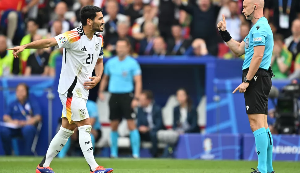 Ilkay Gundogan (21) of Germany reacts towards referee Anthony Taylor during a soccer game between the national teams of Spain and Germany in the Quarter Final stage of the UEFA Euro 2024 tournament, on Thursday 5 July 2024 in Stuttgart, Germany. (Photo by David Catry/Sportpix/Content Curation/Sipa USA) Photo: Content Curation/SIPA USA