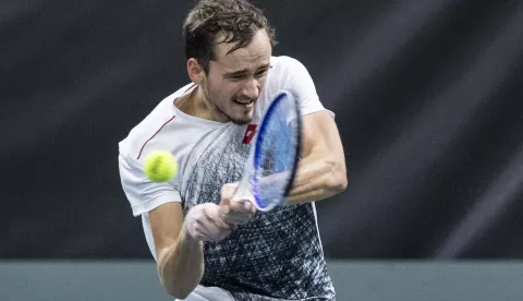 epa07336250 Russia's Daniil Medvedev in action during his singles match against Switzerland's Henri Laaksonen during the Davis Cup tie between Switzerland and Russia, in Biel, Switzerland, 01 February 2019. EPA/PETER SCHNEIDER