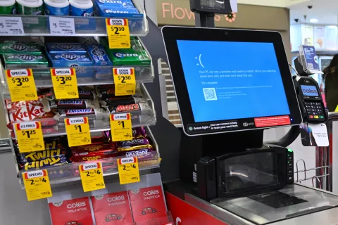 epa11486997 A checkout terminal hit by IT issues is seen at a Coles store in Canberra, Australia, 19 July 2024. Australian banks and media companies have been hit by a major IT outage on 19 July. According to the National Cyber Security Coordinator, the outage relates to a technical issue with a third party software platform, and there is no information to suggest it is a cyber security incident. EPA/LUKAS COCH AUSTRALIA AND NEW ZEALAND OUT