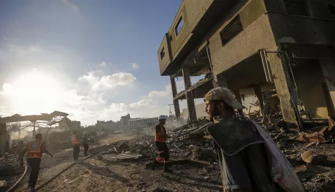 epa11488461 Palestinians inspect the rubble of a destroyed building following an Israeli air strike in the Al-Zawaida neighborhood, central Gaza Strip, 19 July 2024. More than 38,000 Palestinians and over 1,400 Israelis have been killed, according to the Palestinian Health Ministry and the Israel Defense Forces (IDF), since Hamas militants launched an attack against Israel from the Gaza Strip on 07 October 2023, and the Israeli operations in Gaza and the West Bank which followed it. EPA/MOHAMMED SABER