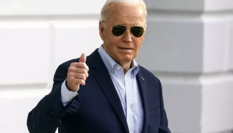 epa11229411 US President Joe Biden gestures as he departs the White House Washington, DC, USA, 19 March 2024. The president is due to attend campaign events in Reno, Nevada. EPA/WILL OLIVER