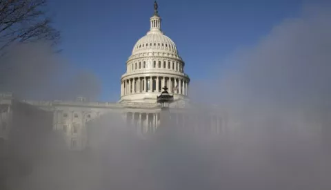 epa08933146 The US Capitol is seen behind steam in Washington, DC, USA, 12 January 2021. At least ten thousand troops of the National Guard will be deployed in Washington by the end of the week, with the possibility of five thousand more, to help secure the Capitol area ahead of more potentially violent unrest in the days leading up to the Inauguration of US President-elect Biden. Democrats are attempting to impeach incumbent US President Trump after he incited a mob of his supporters to riot on the US Capitol in an attempt to thwart Congress from certifying Biden's election victory. EPA/MICHAEL REYNOLDS