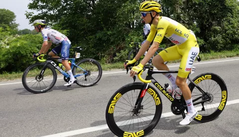 epa11449539 Yellow jersey Slovenian rider Tadej Pogacar (R) of UAE Team Emirates and South African rider Louis Meintjes of Intermarche-Wanty in action during the third stage of the 2024 Tour de France cycling race over 230km from Piacenza to Turin, Italy, 01 July 2024. EPA/KIM LUDBROOK