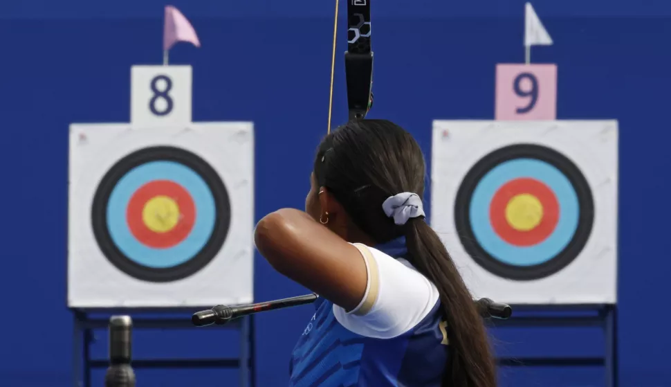 epa11495455 Athletes compete in the Women Individual Ranking Round of the Archery competitions in the Paris 2024 Olympic Games, at the Invalides in Paris, France, 25 July 2024. EPA/CAROLINE BREHMAN