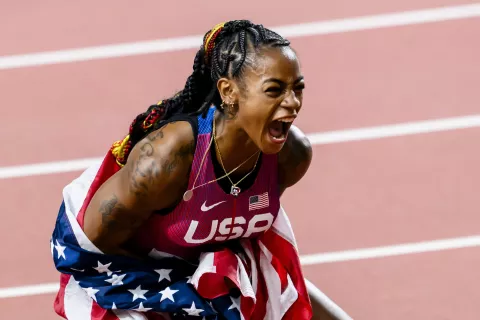 epa10812604 Sha'Carri Richardson of USA celebrates after winning the women's 100 Metres final of the World Athletics Championships in Budapest, Hungary, 21 August 2023. EPA/JEAN-CHRISTOPHE BOTT