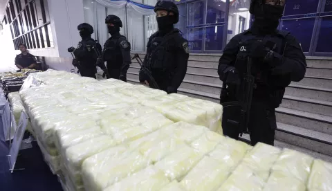 epa11197952 Thai Narcotics Suppression police officers stand guard next to confiscated 14 million methamphetamine pills during a press conference at the Narcotics Suppression Bureau in Bangkok, Thailand, 04 March 2024. Thai police and officials seized 14 million methamphetamine pills and 1,250 kilograms of crystal methamphetamine in line with the Prime Minister's drug problem-solving policy, which focuses on the arrest and destruction of drug networks. EPA/NARONG SANGNAK