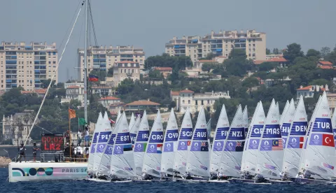 epa11516305 Boats compete in the first race in the Men's Dinghy ILCA 7 class of the Sailing competitions in the Paris 2024 Olympic Games, at the Marseille Marina in Marseille, France, 01 August 2024. EPA/OLIVIER HOSLET