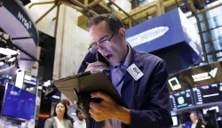 Traders work on the floor of the New York Stock Exchange (NYSE) on Wall Street in New York City on Wednesday, July 3, 2024. The S&P 500 and Nasdaq closed at fresh record highs in a shortened trade day before the 4th Of July Holiday. Photo by John Angelillo/UPI Photo via Newscom Photo: John Angelillo/NEWSCOM