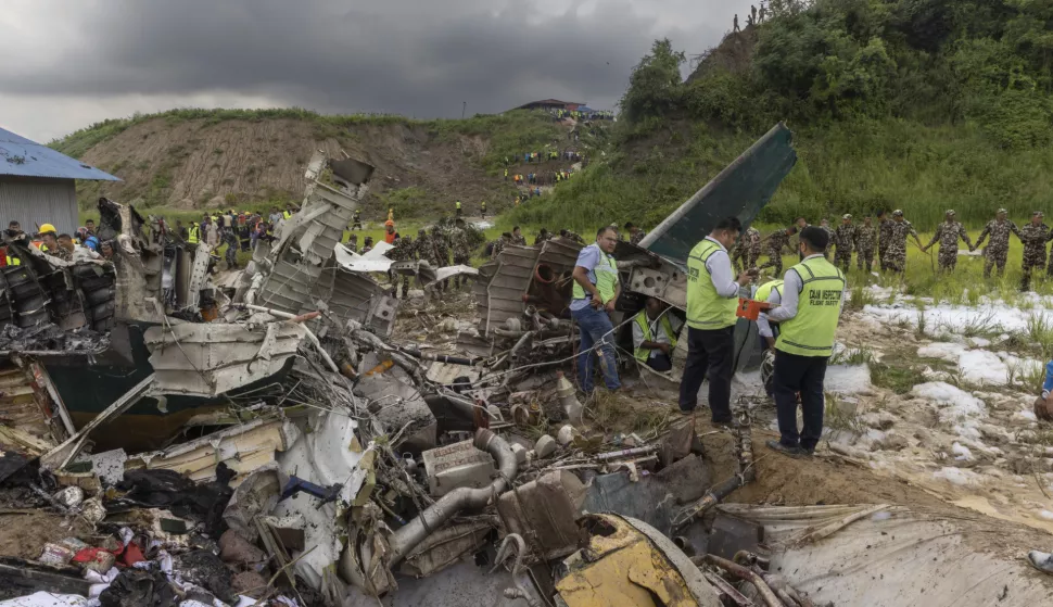 epa11493488 Rescue operations are underway at the site of a plane crash at Tribhuvan International Airport in Kathmandu, Nepal, 24 July 2024. According to a statement by the Civil Aviation Authority of Nepal (CAAN), a Saurya Airlines aircraft heading from Kathmandu to the resort town of Pokhara and carrying 19 people crashed during take off at Tribhuvan International Airport. The bodies of 18 people were recovered while one injured person was taken to hospital. EPA/NARENDRA SHRESTHA