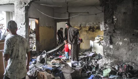 epa11541962 Palestinians inspect the damage following an Israeli strike on the Al-Taba'een school in the Daraj Tuffah neighborhood of Gaza, 10 August 2024. At least 93 people were killed in the strike, said the director of Al-Ahli Hospital in Gaza City. According to the Israel Defense Forces (IDF) the strike was carried out against a Hamas 'control center embedded in the Al-Taba'een school, adjacent to a mosque in Daraj Tuffah, which serves as a shelter for the residents of Gaza City'. More than 39,600 Palestinians and over 1,400 Israelis have been killed, according to the Palestinian Health Ministry and the Israel Defense Forces (IDF), since Hamas militants launched an attack against Israel from the Gaza Strip on 07 October 2023, and the Israeli operations in Gaza and the West Bank which followed it. EPA/MAHMOUD ZAKI