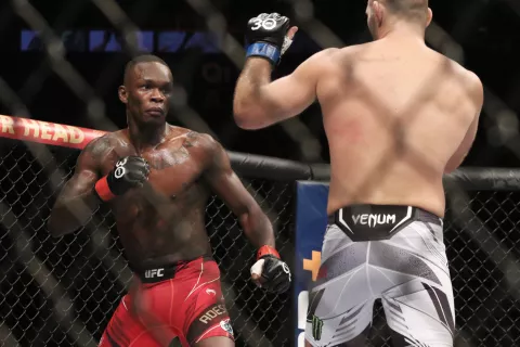 Sep 9, 2023; Sydney, NSW, AUSTRALIA; Israel Adesanya (red gloves) fights Sean Strickland (blue gloves) during UFC 293 at Qudos Bank Arena. 