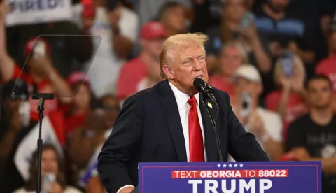 epa11523814 Republican presidential candidate Donald J. Trump speaks during a campaign rally at the Georgia State Convocation Center in Atlanta, Georgia, USA, 03 August 2024. EPA/EDWARD M. PIO RODA