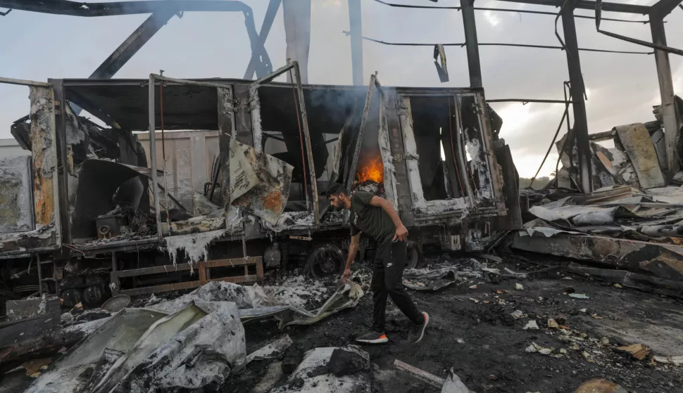 epa11552566 A Palestinian man walks among the rubble following an overnight Israeli airstrike on Al-Zawayda neighborhood, central Gaza Strip, 17 August 2024. According to the Palestinian Civil Defense, more than 15 Palestinians were killed in the airstrike, with a dozen more missing under the rubble of a destroyed building. More than 40,000 Palestinians and at least 1,400 Israelis have been killed, according to the Gaza Government media office and the Israel Defense Forces (IDF), since Hamas militants launched an attack against Israel from the Gaza Strip on 07 October, and the Israeli operations in Gaza and the West Bank which followed it. EPA/MOHAMMED SABER