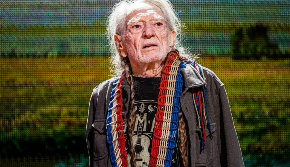 Willie Nelson pauses while leaving the stage after his performance to gaze upon the sold out crowd and blow them kisses at Farm Aid 2023 on Saturday, Sept. 23, 2023, at Ruoff Music Center in Noblesville, Ind. (Photo by Michelle Pemberton/IndyStar/USA Today Network/Sipa USA) Photo: USA TODAY NETWORK/SIPA USA