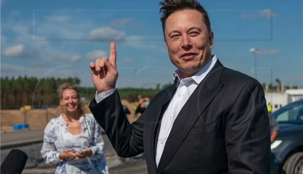 epa08925442 (FILE) - Tesla and SpaceX CEO Elon Musk (R) gives a statement at the construction site of the Tesla Giga Factory in Gruenheide near Berlin, Germany, 03 September 2020 (Reissued 07 January 2021). According to reports on 07 January 2021, Tesla and SpaceX CEO Elon Musk became the world richest person with a net worth of more than 185 billion US dollars, surpassing Jeff Bezos, CEO of Amazon, who is currently worth 184 billion US dollars. EPA/ALEXANDER BECHER *** Local Caption *** 56315718