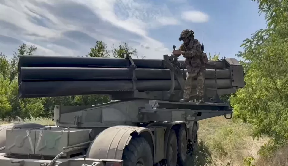 epa11545493 A still image taken from handout video provided by the Russian Defence ministry press-service shows the crew of the 'Uragan' multiple launch rocket system of the artillery of the Vostok group of forces preparing for launch in one of the sections of the line of combat contact of the South Donetsk direction of the special military operation, Donetsk region, 11 August 2024. EPA/RUSSIAN DEFENCE MINISTRY PRESS SERVICE/HANDOUT HANDOUT HANDOUT EDITORIAL USE ONLY/NO SALESHANDOUT EDITORIAL USE ONLY/NO SALES