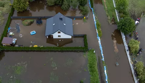 epa11559589 An aerial view photo taken with a drone shows flooded areas near the old Topornica River bed in Zamosc, Poland, 22 August 2024. On 21 August, a violent storm passed over the city, causing a record rainfall of over 147 mm of rain. According to local authorities, the western part of the city suffered the most. Water poured into two schools, as well as a school dormitory and one of the kindergartens. EPA/Wojtek Jargilo POLAND OUT