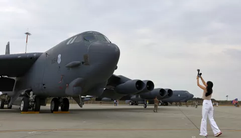 epa11492566 A Romanian TV journalist (R) films a B52 bomber of the US Air Force, during a media event held at Mihail Kogalniceanu NATO air-base at the Black Sea shore, in Romania, 23 July 2024. Two US Air Force B-52H Stratofortress aircraft assigned to the 2nd Bomb Wing, Barksdale Air Force Base, Louisiana, arrived at Mihail Kogalniceanu Airbase, Romania, for Bomber Task Force Europe 24-4, according to a US European Command statement on 21 July. While flying in international airspace and in accordance with international law, the U.S. B-52 aircraft were intercepted by two Russian aircraft over the Barents Sea, but the US aircraft did not change course due to the intercept and continued along their scheduled flight plan without incident before landing in Romania, the statement added. The B-52H Stratofortress is a long-range, heavy bomber that can carry nuclear or precision guided conventional ordnance with worldwide precision delivery, and can perform strategic attack, close-air support, air interdiction, offensive counter-air and maritime operations. EPA/ROBERT GHEMENT