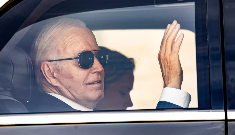 epa11490669 (FILE) - US President Joe Biden greets from his car as he leaves Elysee palace after a joint statement with France's President Macron (not pictured) in Paris, France, 08 June 2024 (reissued 21 July 2024). Joe Biden on 21 July announced he would not seek re-election in November 2024. "While it has been my intention to seek reelection, I believe it is in the best interest of my party and the country for me to stand down and to focus solely on fulfilling my duties as President for the remainder of my term", Biden announced on his X (formerly Twitter) account. EPA/CHRISTOPHE PETIT TESSON