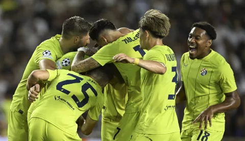 epa11569507 Players of Dinamo celebrate the 0-2 goal during the UEFA Champions League, play-offs 2nd leg match between Qarabag and Dinamo at the Tofiq Bahramov Republican stadium in Baku, Azerbaijan, 28 August 2024. EPA/ROMAN ISMAILOV