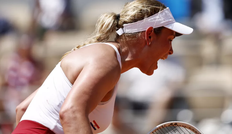 epa11508539 Donna Vekic of Croatia reacts during the Women's Singles third round match against Coco Gauff of the US at the Tennis competitions in the Paris 2024 Olympic Games, at the Roland Garros in Paris, France, 30 July 2024. EPA/RITCHIE B. TONGO