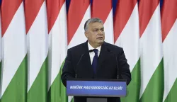 epa11160891 Hungarian Prime Minister Viktor Orban delivers his annual 'State of Hungary' address in Budapest, Hungary, 17 February 2024. The inscription on the podium reads: 'For us Hungary is the first!'. EPA/SZILARD KOSZTICSAK HUNGARY OUT