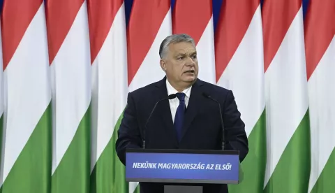 epa11160891 Hungarian Prime Minister Viktor Orban delivers his annual 'State of Hungary' address in Budapest, Hungary, 17 February 2024. The inscription on the podium reads: 'For us Hungary is the first!'. EPA/SZILARD KOSZTICSAK HUNGARY OUT