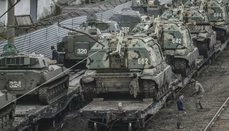 epa09778300 Russian armored vehicles at the railway station in Rostov region, Russia, 23 February 2022. The Russian president on 21 February convened an extraordinary meeting of the Russian Security Council, to discuss the recognition of the self-proclaimed Donetsk People's Republic (DNR) and Luhansk People's Republic (LNR). On the same day he signed a decree recognizing the two republics of Donbass as independent states, as well as an agreement on friendship, cooperation and mutual assistance. The Russian Defense Ministry was instructed to ensure the maintenance of peace by the Russian armed forces. EPA/STRINGER