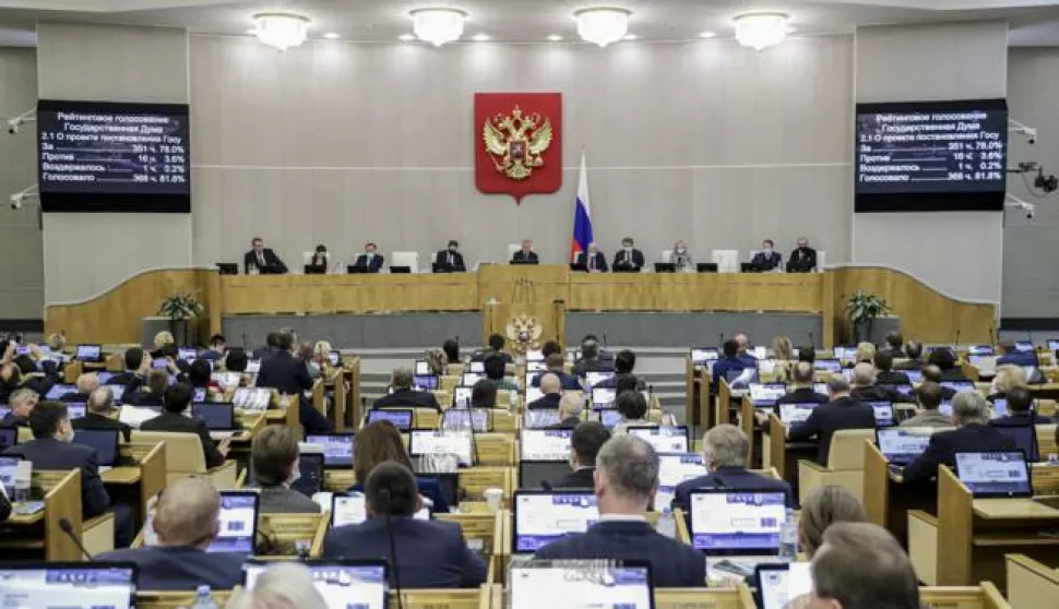 epa09759550 A handout photo made available by the press service of the Russian State Duma shows the plenary session of the State Duma (Russia's lower house of parliament) during election for the draft resolution 'On the appeal of the State Duma' to the President of the Russian Federation Vladimir Putin on the need to recognise the Donetsk People's Republic and the Lugansk People's Republic in Moscow, Russia, 15 February 2022. Russian deputies supported the resolution on the appeal to the Vladimir Putin on the need to recognise the DPR and LPR. As the Chairman of the State Duma Vyacheslav Volodin noted, the appeal will be sent immediately. The deputies believe that the recognition of the DPR and LPR will create grounds for guaranteeing the security and protection of the inhabitants of the republics from external threats, as well as for strengthening international peace and regional stability in accordance with the purposes and principles of the UN Charter and will initiate the process of international recognition of both states EPA/RUSSIAN STATE DUMA PRESS SERVICE HANDOUT HANDOUT EDITORIAL USE ONLY/NO SALES HANDOUT EDITORIAL USE ONLY/NO SALES