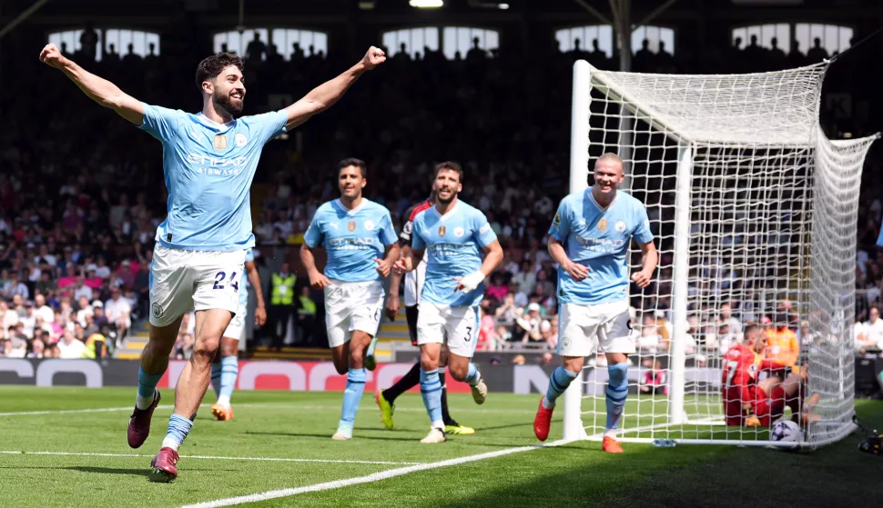 Manchester City's Josko Gvardiol celebrates scoring their side's third goal of the game during the Premier League match at Craven Cottage, London. Picture date: Saturday May 11, 2024. Photo: Zac Goodwin/PRESS ASSOCIATION