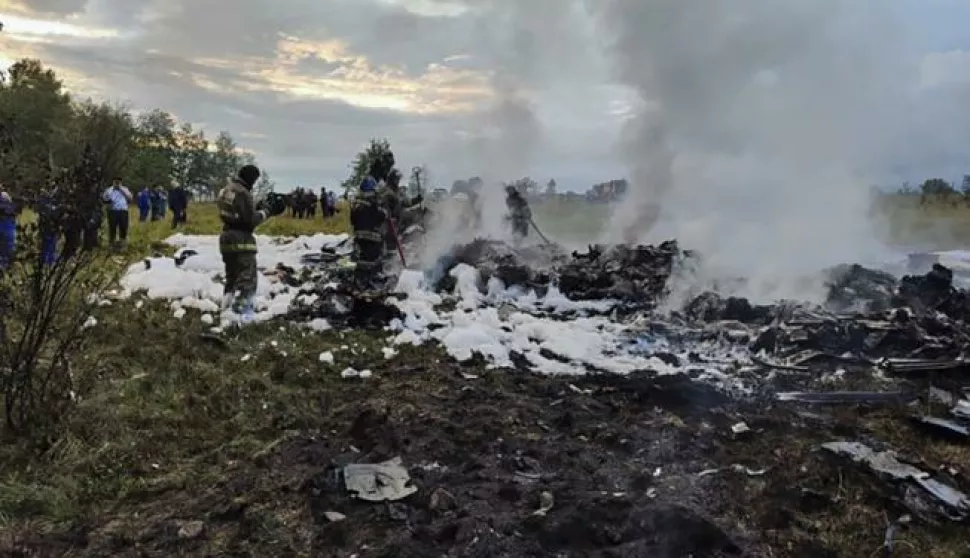 epa10816489 A handout picture made available by Russian Investigative Committee shows Russian emergency service work on the site of the plane crash near the village of Kuzhenkino, Tver region, Russia, 23 August 2023. An investigation was launched into the crash of an aircraft in the Tver region in Russia on 23 August 2023, the Russian Federal Air Transport Agency said in a statement. Among the passengers was Yevgeny Prigozhin, the agency reported. EPA/RUSSIAN INVESTIGATIVE COMMITEE HANDOUT HANDOUT EDITORIAL USE ONLY/NO SALES