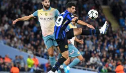 Jusko Gvardiol of Manchester City battles for the ball with Mehdi Taremi of Inter Milan during the UEFA Champions League match at the Etihad Stadium, ManchesterPicture by Karl Vallantine/Focus Images/Sipa USA 07712 69575518/09/2024 Photo: Focus Images/SIPA USA