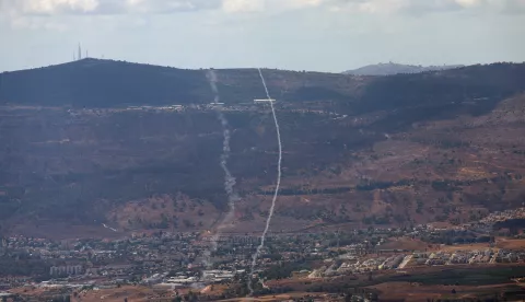 epa11609447 Smoke trails in the sky after the Israeli Iron Dome air defense system intercepts missiles fired from southern Lebanon over the upper Galilee, northern Israel, 17 September 2024. The IDF said that a number of UAVs were identified crossing from southern Lebanon over the Upper Galilee on 17 September, after the Israeli air forces had struck Hezbollah infrastructure and eliminated three people in the area of Blida, southern Lebanon. EPA/ATEF SAFADI