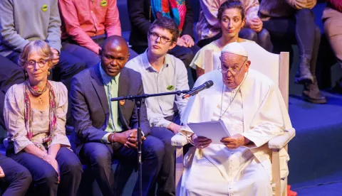 epa11630579 Pope Francis (R), delivers a speech during a meeting with students of the French-speaking Catholic University of Louvain (UCLouvain) in Louvain la Neuve, Belgium, 28 September 2024. Pope Francis is in Belgium on a trip to 'the heart of Europe' to discuss the continent's role in the world. The pastoral visit to Brussels, focusing on the celebrations of the 600th anniversary of the Catholic University of Leuve in Belgium, will last until 29 September. In 1968, the Catholic University of Leuven splits into Dutch-speaking and French-speaking universities. EPA/OLIVIER MATTHYS