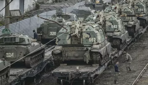 epa09778300 Russian armored vehicles at the railway station in Rostov region, Russia, 23 February 2022. The Russian president on 21 February convened an extraordinary meeting of the Russian Security Council, to discuss the recognition of the self-proclaimed Donetsk People's Republic (DNR) and Luhansk People's Republic (LNR). On the same day he signed a decree recognizing the two republics of Donbass as independent states, as well as an agreement on friendship, cooperation and mutual assistance. The Russian Defense Ministry was instructed to ensure the maintenance of peace by the Russian armed forces. EPA/STRINGER