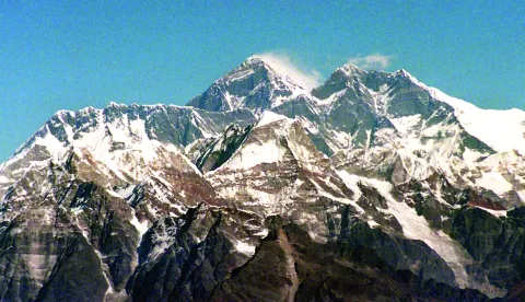 epa05981343 (FILE) - A file picture dated 29 November 1996 showing the Himalya range and Mount Everest, the highest mountain on earth (C) from an airplane in Nepal. Accoding to reports from 22 May 2017, the Hillary Step on Mount Everest collapsed. The 12-metres outcrop was the last obstacle on the way to Mount Everest's peak. EPA/MARTIN ATHENSTAEDT GERMANY OUT