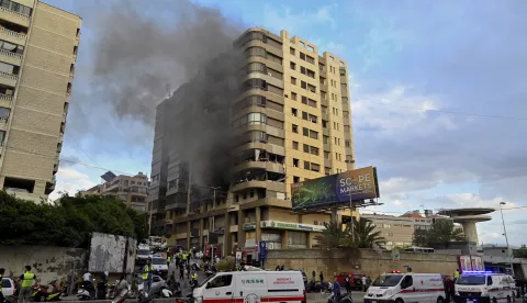 epa11635910 Smoke rises from a building following an Israeli military strike, in the southern suburbs of Beirut, Lebanon, 01 October 2024. According to the Lebanese National News Agency (NNA), Israel targeted two areas in the southern suburbs of Beirut. The Israeli army (Tsahal) said it conducted 'a precise strike' on Beirut on 01 October. EPA/WAEL HAMZEH