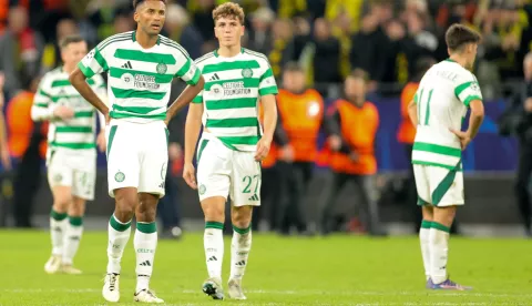 epa11636767 Celtic players Auston Trusty (L) and Arne Engels (R) look on after losing the UEFA Champions League match between Borussia Dortmund and Celtic in Dortmund, Germany, 01 October 2024. EPA/FRIEDEMANN VOGEL