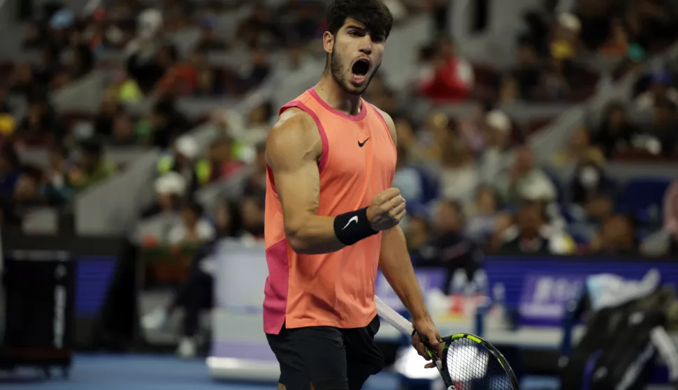 epa11637516 Carlos Alcaraz of Spain reacts during his Men's Singles Final match against Jannik Sinner of Italy at the China Open tennis tournament in Beijing, China, 02 October 2024. EPA/ANDRES MARTINEZ CASARES