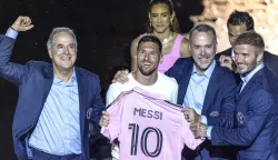 epaselect epa10750691 The Seven-time Ballon d'Or winner and World Cup Champion, Lionel Messi holds the Inter Miami CF Jersey (C) next to Inter Miami CF Managing Owner Jorge Mas (L), Jose Mas, and Inter Miami CF Co-Owner David Beckham (R) during the 'La PresentaSion' event hosted by Inter Miami CF at the Inter Miami CF and DRV PNK Stadium in Fort Lauderdale, Florida, USA, 16 July 2023. 'La PresentaSion' is an event to unveiling the team's newest signing, soccer icon Lionel Messi. EPA/CRISTOBAL HERRERA-ULASHKEVICH