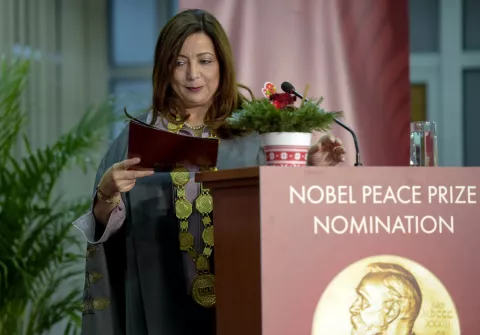 epa07238377 Tunisian economist Uided Bushamaui, one of the 2015 Nobel Peace Prize winners, announces her proposal to nominate the two prime ministers of Macedonia and Greece, Zoran Zaev and Alexis Tsipras, for the Nobel Peace Prize for signing a landmark agreement between their countries in Skopje, the Former Yugoslav Republic of Macedonia on 18 December 2018. EPA/NAKE BATEV