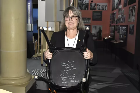 epa07211965 The Nobel Prize laureate in physics Donna Strickland holds the chair she signed at the Nobel Museum in Stockholm, Sweden, 06 December 2018. EPA/CLAUDIO BRESCIANI/TT SWEDEN OUT