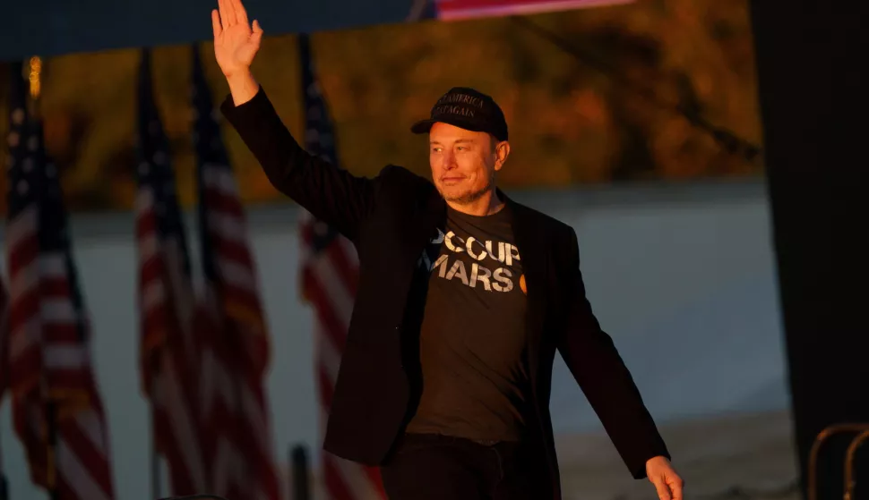 epa11644530 Businessperson Elon Musk at the Butler Farm Show where former US President and Republican presidential nominee Donald Trump held a rally in Butler, Pennsylvania, USA, 05 October 2024. The rally is taking place at the same location where a gunman attempted to assassinate former president Trump in July. EPA/WILL OLIVER