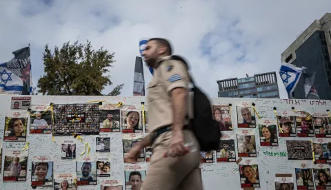 epa10997384 Portraits of people abducted by Hamas militants displayed on a installation held by the 'Bring Them Home Now' organisation to support the families of hostages and call for their release, outside the Tel Aviv museum in Tel Aviv, Israel, 27 November 2023. More than 14,000 Palestinians and at least 1,200 Israelis have been killed, according to the Gaza Government media office and the Israel Defense Forces (IDF), since Hamas militants launched an attack against Israel from the Gaza Strip on 07 October, and the Israeli operations in Gaza and the West Bank which followed it. EPA/CHRISTOPHE PETIT TESSON