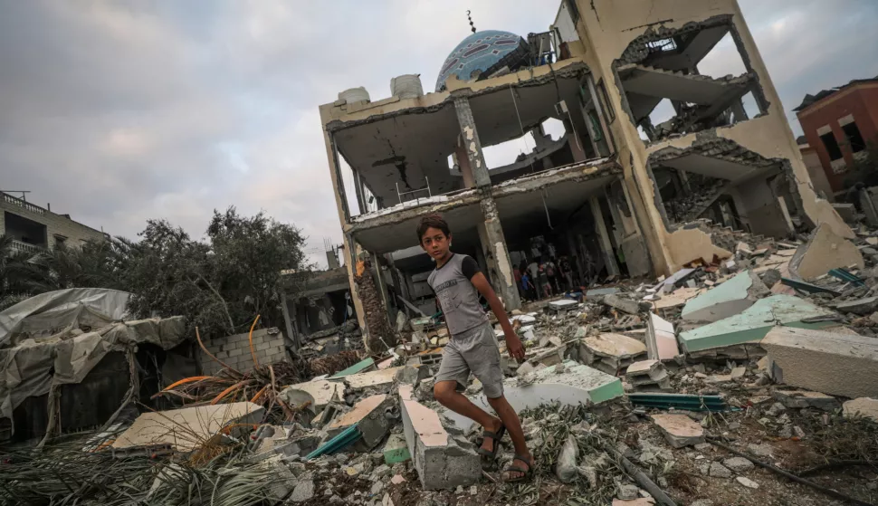 epa11644753 Palestinians inspect the rubble of the destroyed Al Aqsa Martyrs Mosque following an Israeli airstrike in Deir Al Balah, central Gaza Strip, 06 October 2024. According to the Palestinian Ministry of Health in Gaza, at least 18 Palestinians were killed in an Israeli airstrike in Deir Al Balah on 06 October. More than 41,800 Palestinians and over 1,400 Israelis have been killed, according to the Palestinian Health Ministry and the Israel Defense Forces (IDF), since Hamas militants launched an attack against Israel from the Gaza Strip on 07 October 2023, and the Israeli operations in Gaza and the West Bank which followed it. EPA/MOHAMMED SABER