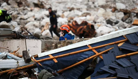 epa11642941 Relief and rescue workers asses the debris and damage caused by the flash floods in Donja Jablanica, Bosnia and Herzegovina, 05 October 2024. Central and southern parts of Bosnia and Herzegovina were hit by a severe rainstorm on 03 October 2024, which caused widespread flooding, closing roads, cutting electricity, and disrupting telecom signals. Rescue services in Jablanica and Kiseljak reported several people missing and called for army assistance, as access to Jablanica was completely blocked due to road and rail closures. 19 fatalities due to the flash floods have been confirmed so far by the regional government of Hercegovacko-Neretvanska county. EPA/NIDAL SALJIC