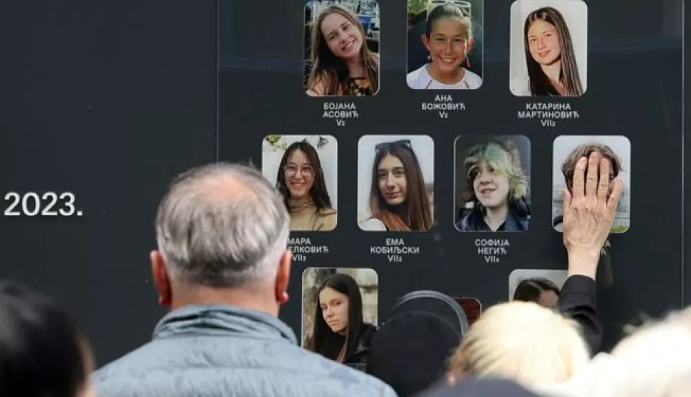 epa11315692 People pay tribute to the victims of the shooting at 'Vladislav Ribnikar' elementary school in Belgrade, Serbia, 03 May 2024. On 03 May 2023, a teenage student fatally shot nine students and a school guard using two handguns, which he had taken from his father. Six others, five students and a teacher, also sustained injuries in the attack. EPA/ANDREJ CUKIC