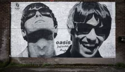 epa11570725 A mural of Liam and Noel Gallagher of British band Oasis is seen near Sifters Records in Manchester, Britain, 29 August 2024. The mural was painted by street artist Pic.One.Art in June 2024 to mark the 30th anniversary of the band's debut album, Definitely Maybe. Oasis have announced a number of live reunion concert dates in Cardiff, Manchester, London, Edinburgh, and Dublin, having reformed after a 15-year split. EPA/ADAM VAUGHAN